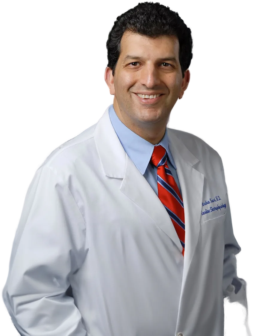 Dr. Arshia Noori, cardiac electrophysiologist, in a white coat
